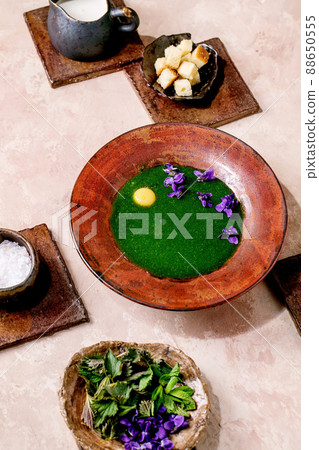 Spring herbasl nettle puree soup 88650555