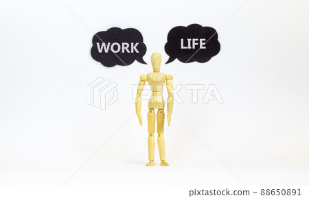 Work life balance symbol. Concept words Work and Life. Wooden model of businessman human. Black paper. Beautiful white background, copy space. Business and work life balance concept. Work life balance symbol. Concept words Work and Life. Wooden model of businessman human. Black paper. Beautiful white background, copy space. Business and work life balance concept. 88650891