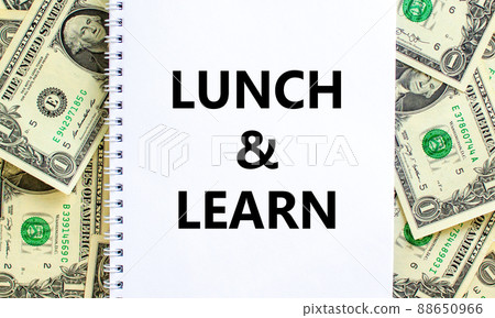 Lunch and learn symbol. Words 'Lunch and learn' on white note. Beautiful background from dollar bills. Business, educational and lunch and learn concept. Copy space. 88650966