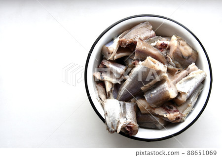 Pieces of raw Whiting fish for frying in a saucepan Pieces of raw Whiting fish for frying in a saucepan 88651069