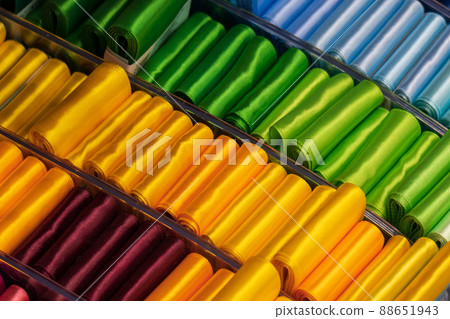 Multi colored fabrics sale of hobby goods. Bright handmade concept. Textile industry. Multi colored fabrics sale of hobby goods. Bright handmade concept. Textile industry. 88651943