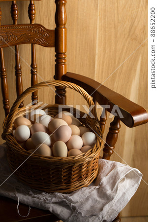 Large basket of chicken eggs Large basket of chicken eggs 88652200
