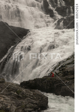 Dancing with the water in Kjosfossen waterfall Dancing with the water in Kjosfossen waterfall 88652914