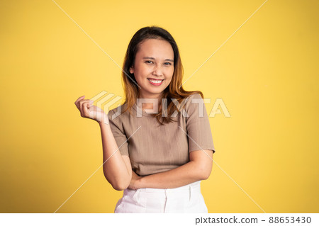 asian woman with cute smile standing on isolated background asian woman with cute smile standing on isolated background 88653430