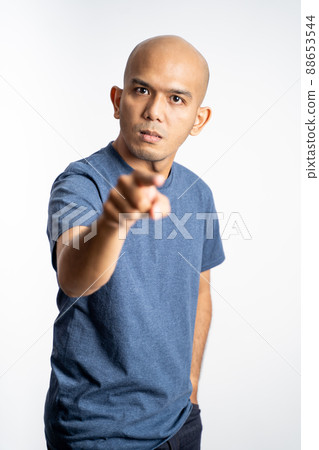 angry bald man with finger pointing forward 88653544