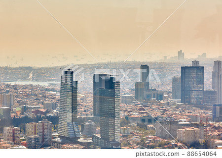 Istanbul, Turkey - 1 April, 2017: Urban landscape of European side of Istanbul and Bosphorus Strait on a horizon. Modern part of city with business towers of international corporations, skyscrapers 88654064