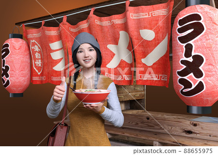 A girl wearing a knit hat happily eats ramen at a ramen shop with red curtains and lanterns lowered is Goodsa A girl wearing a knit hat happily eats ramen at a ramen shop with red curtains and lanterns lowered is Goodsa 88655975