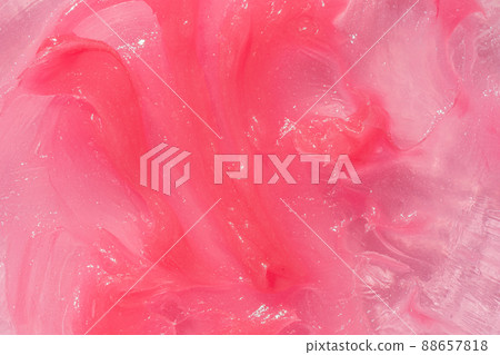 Pink creamy balm product closeup. Moisturising and cleaning beauty product sample swatch. Cosmetic smear Pink creamy balm product closeup. Moisturising and cleaning beauty product sample swatch. Cosmetic smear 88657818