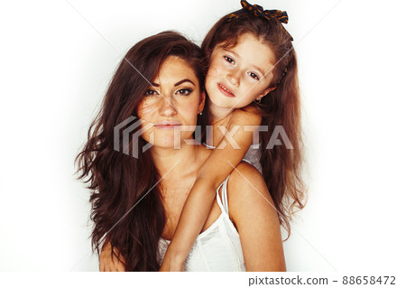 bright picture of hugging mother and daughter happy together, smiling stylish family. lifestyle people concept 88658472