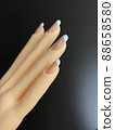 French nail to the doll in the hand 88658580