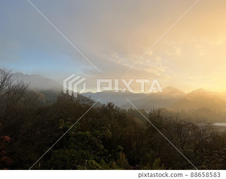Mountains and sky in the morning sun 88658583