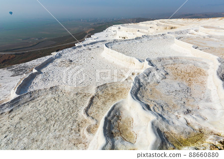 Natural travertine terraces with hot springs in Pamukkale, Turkey 88660880