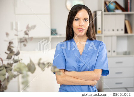 Waist-up portrait of woman medic in office Waist-up portrait of woman medic in office 88661001