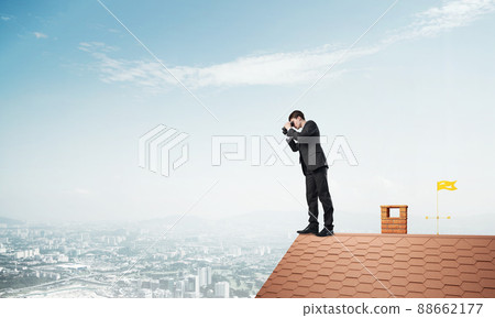 Mister boss on brick roof in search of something new. Mixed media 88662177