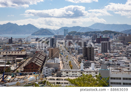 It is a distant view of the Ujina area in Minami-ku, Hiroshima city. The brick structure in the foreground is the site of the former Army clothing yard. The building in the distant view is the venue for the G7 Summit 88663039