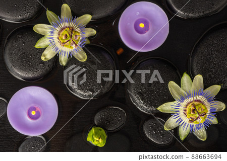 Beautiful spa concept of blooming passiflora flowe Beautiful spa concept of blooming passiflora flowe 88663694