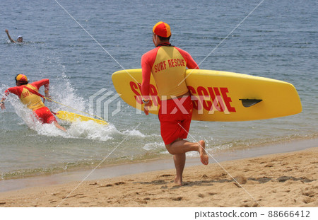 Rescue training at Suma Beach (Kobe City), surf rescue team heading for rescue 88666412
