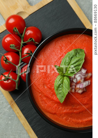 Gazpacho soup and ingredients on gray textured background Gazpacho soup and ingredients on gray textured background 88669130
