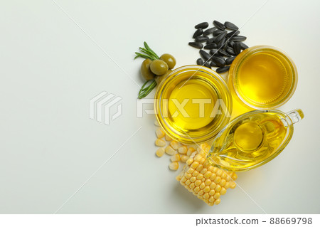 Set of different oils on white background 88669798