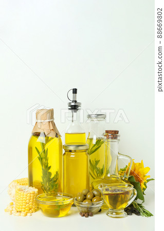 Set of different oils on white background 88669802