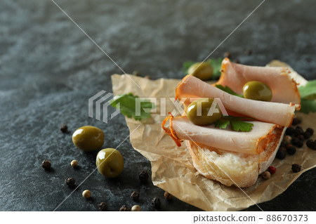 Delicious bruschetta snack on black smokey background 88670373