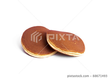 Two pancakes isolated on a white background Two pancakes isolated on a white background 88671493
