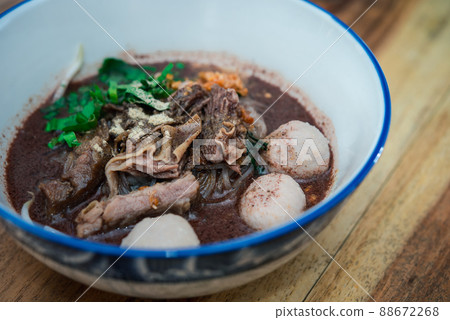 Braised beef clear noodle with meat ball soup stew 88672268
