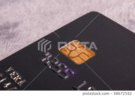 Bank card on a gray background closeup Bank card on a gray background closeup 88672582