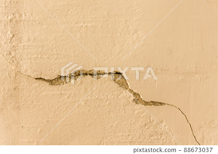 Crack on the old broken concrete retro surface of the cement wall cracked texture damaged background 88673037