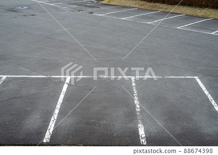 White line in the parking lot White line in the parking lot 88674398