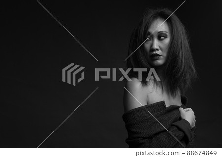 sensual korean woman portrait profile in dark background sensual korean woman portrait profile in dark background 88674849