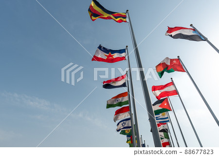 Flags of many countries on flagpoles, international cooperation concept Flags of many countries on flagpoles, international cooperation concept 88677823