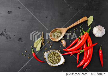 Flat lay composition with chili peppers and spices Flat lay composition with chili peppers and spices 88678814