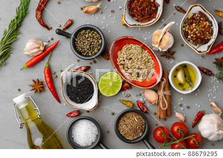 Olive oil and spices on kitchen table 88679295