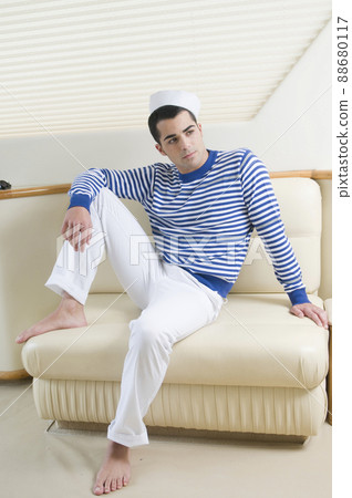 young sailor on a private yacht ready to sail young sailor on a private yacht ready to sail 88680117