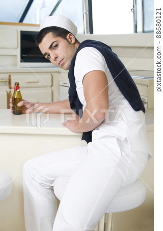 young sailor on a private yacht ready to sail young sailor on a private yacht ready to sail 88680121