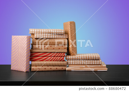 Education concept with stack of books on a table against colored background. Education concept with stack of books on a table against colored background. 88680472