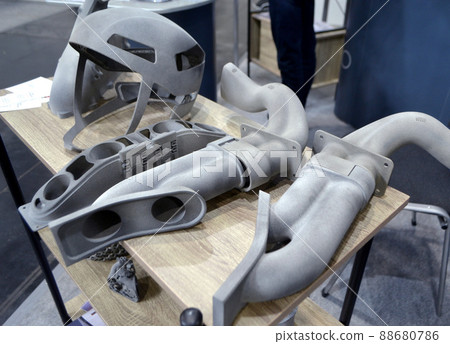 Many different objects printed on 3D printer from powder polyamide. 88680786