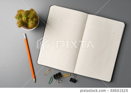 Blank notebook with pen are on top of office desk table Blank notebook with pen are on top of office desk table 88681828