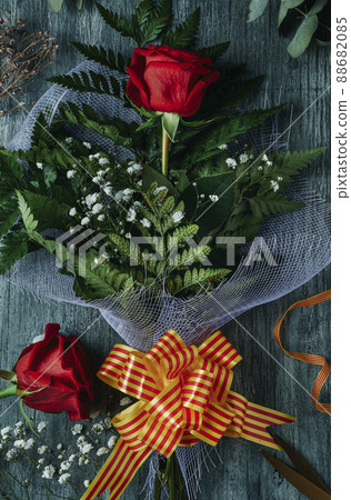 red rose with the Catalan flag for Sant Jordi Day 88682085