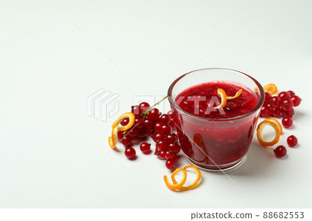 Cranberry sauce and ingredients on white background 88682553