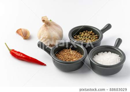 Bowls with various spices on white background 88683029