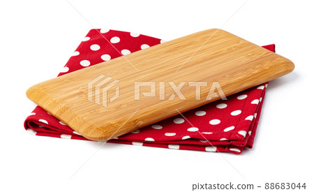 Wooden board and tablecloth isolated on white Wooden board and tablecloth isolated on white 88683044
