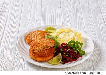 salmon patty with potato mash and beetroot salad 88684015