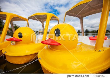 Yellow duck Pedal boat in park. Yellow duck Pedal boat in park. 88684820