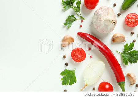 Spicy vegetables on white background, space for text Spicy vegetables on white background, space for text 88685155