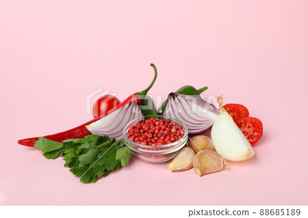 Different spicy vegetables on pink background, close up 88685189