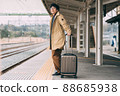 People waiting at the train platform 88685938