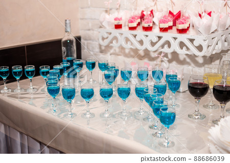 Wedding buffet. Blue alcoholic cocktail 88686039