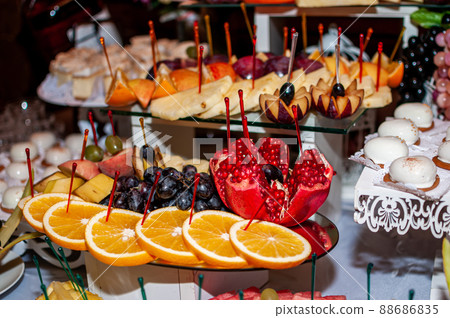 Fruit slicing at the wedding buffet 88686835